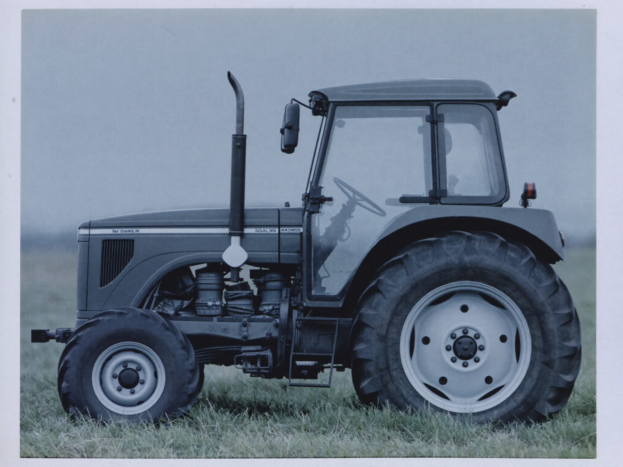 A tractor in a farm yard