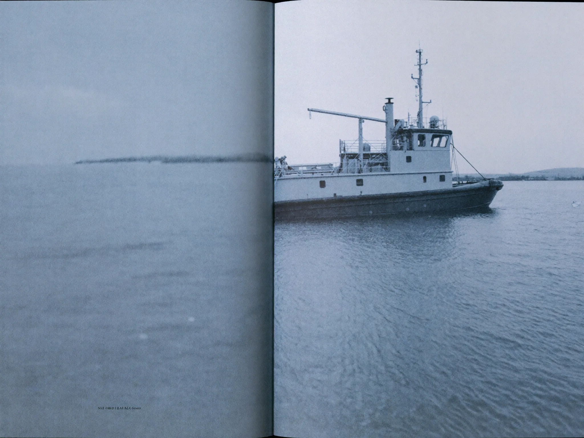 A harbor tug alongside a quay